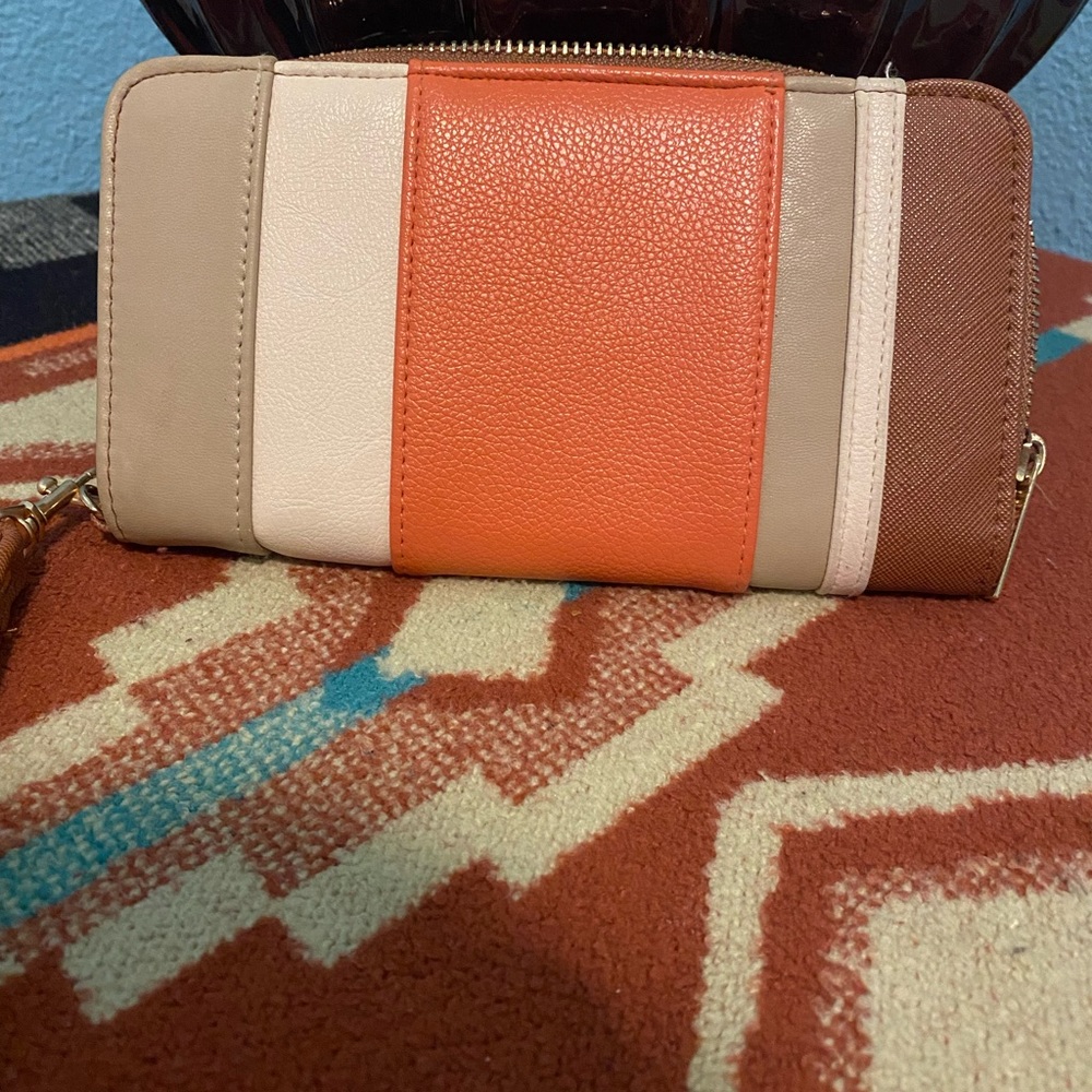 Women’s orange and brown leather wallet